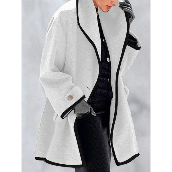 Stylish coat with contrast piping