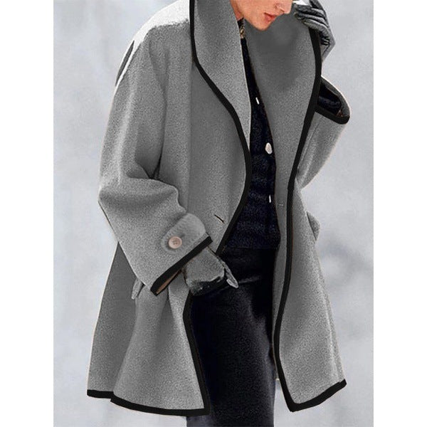 Stylish coat with contrast piping