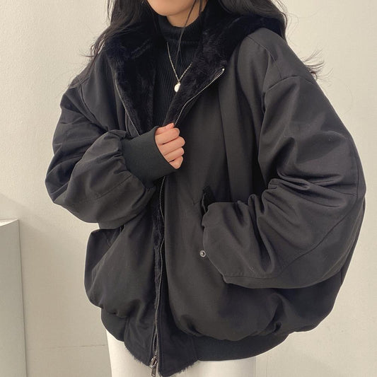 Oversized winter bomber jacket with a shearling lining