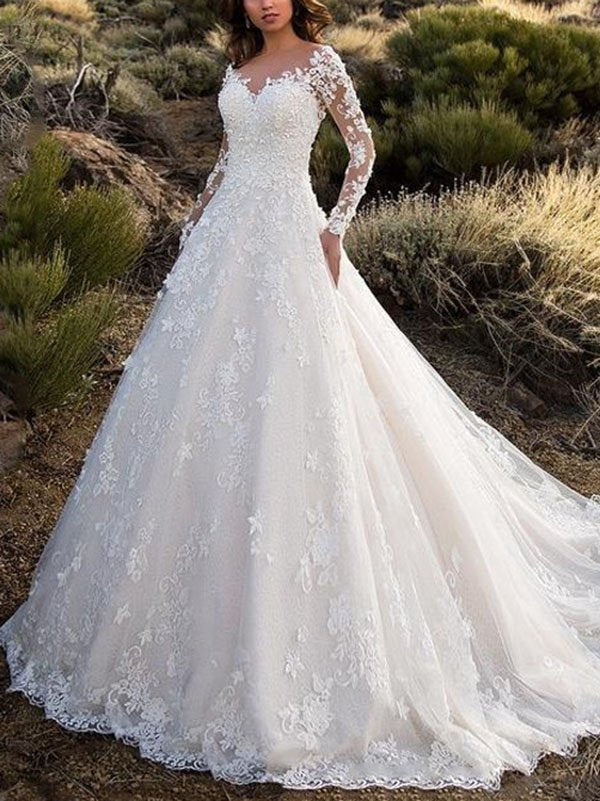 Ladies wedding dress with elegant lace processing and voluminous skirt Eloura-Moda