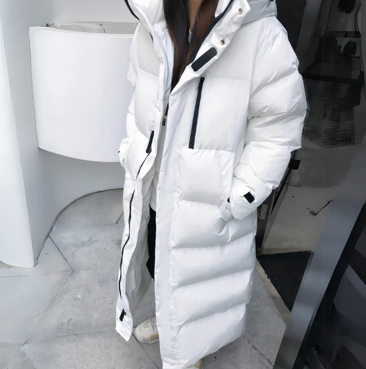 Long quilted jacket with a hood and thick insulation