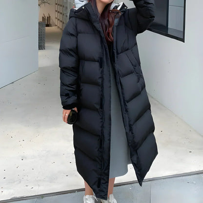Long quilted jacket with a hood and thick insulation