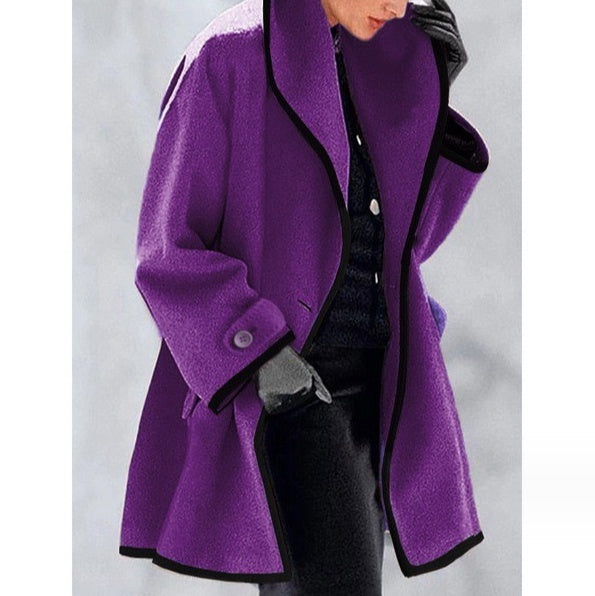 Stylish coat with contrast piping