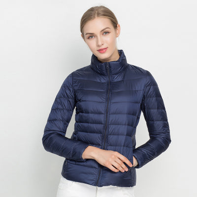 Light quilted jacket in navy blue with a high collar